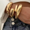 Solstice Shine – A Sculptural Gold Bangle Set